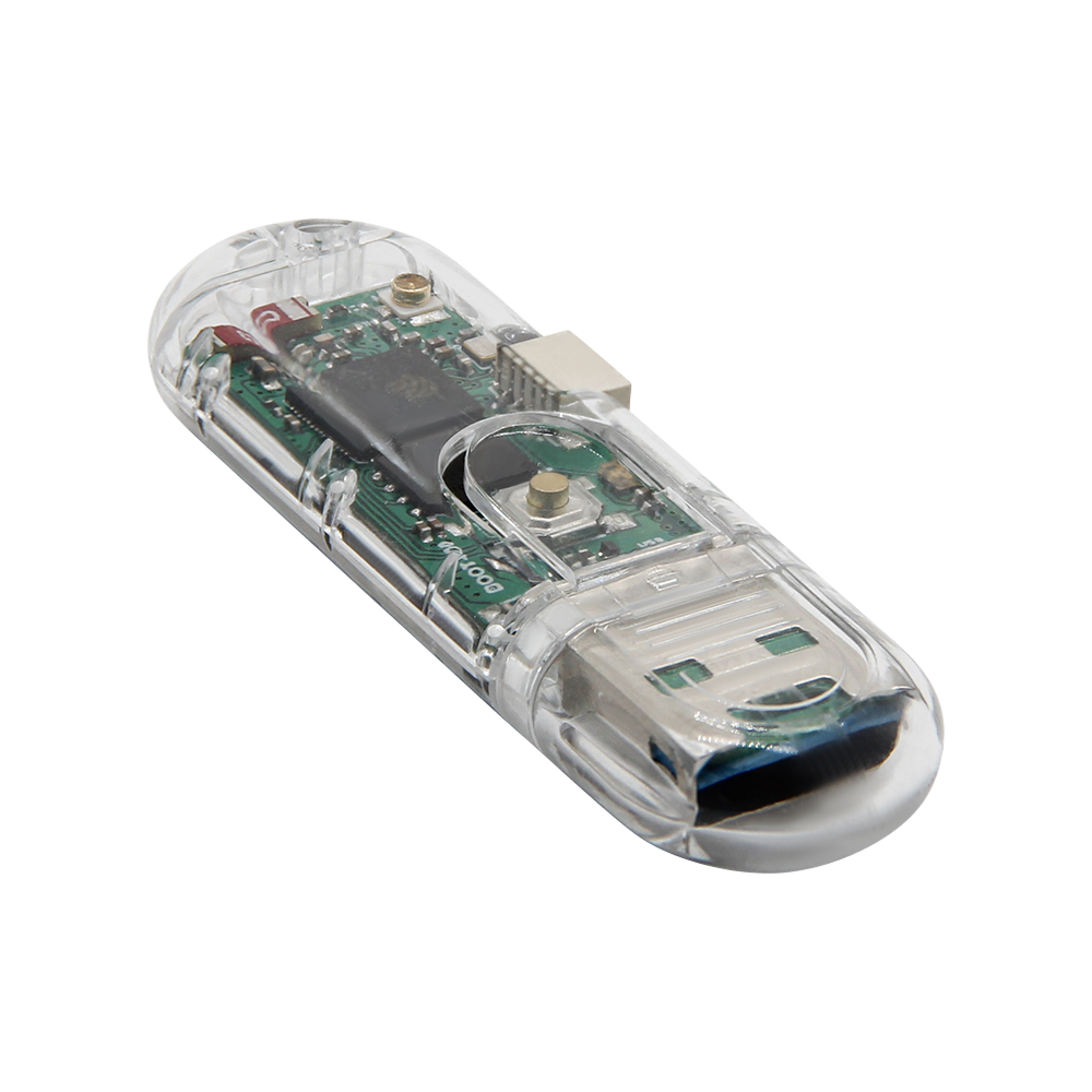Back of a LILYGO T-Dongle-S3. The small round button is next to the USB plug, beneath the clear case opening.